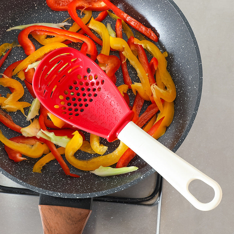 Multifunctional slotted cooking spoon and masher