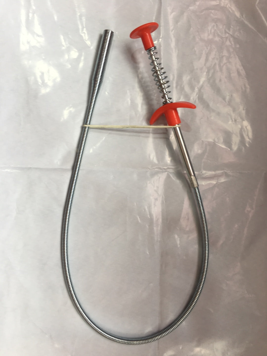 Flexible spring drain clog remover tool