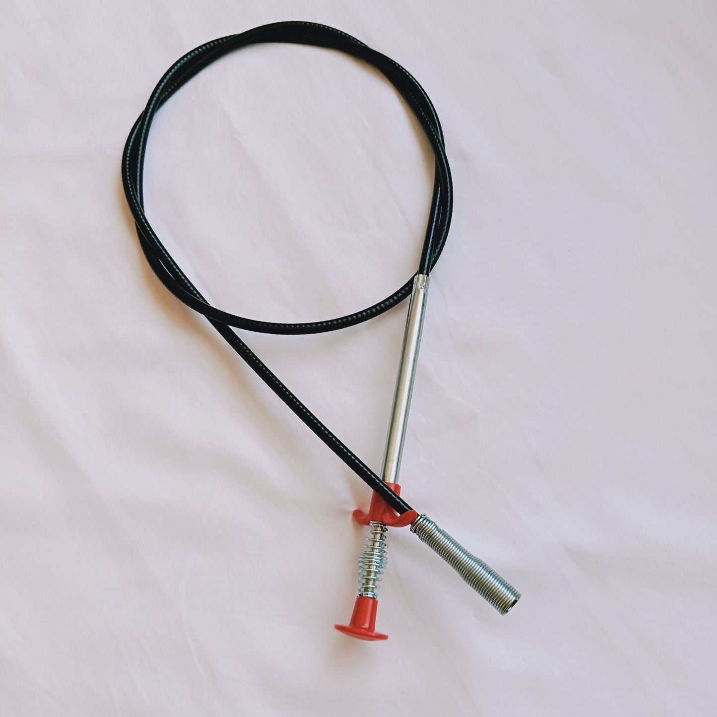 Flexible spring drain clog remover tool